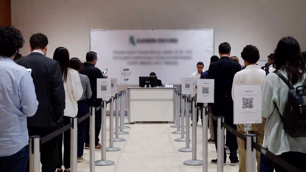 Registration signage prevents bottlenecks before they form.